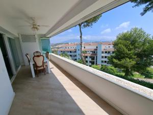 a balcony with a view of a building at Rancho B 5 in Mijas Costa