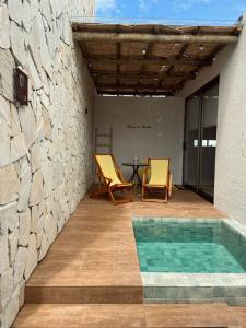 A piscina localizada em Lotus Patacho ou nos arredores