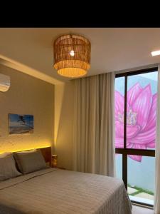 Cama ou camas em um quarto em Lotus Patacho