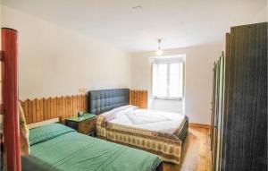 Letto o letti in una camera di Amazing Apartment In Codivara With Wifi