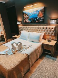 Tempat tidur dalam kamar di Akhome - Luxury dublex apartment