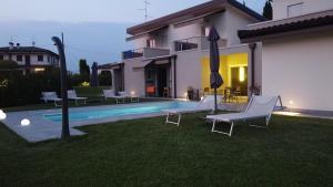 The swimming pool at or close to Lough appartamento
