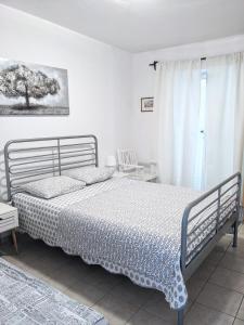 Cama o camas de una habitación en Central Studio Apartments & Dormitory Rooms