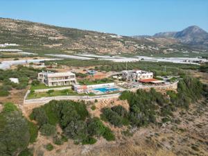 an aerial view of a building on a hill at Panorama Hotel in Falasarna
