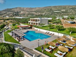 an aerial view of a resort with a swimming pool at Panorama Hotel in Falasarna