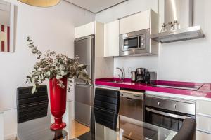 Kuchyň nebo kuchyňský kout v ubytování Waou Apartamentos en Sol Superior 2