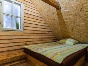 Tempat tidur dalam kamar di Słoneczny Zakątek