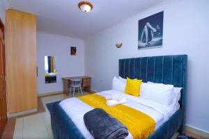 Postel nebo postele na pokoji v ubytování One bedroom near garden city