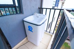 Balkón nebo terasa v ubytování One bedroom near garden city