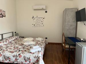 En eller flere senger på et rom på B&B Piandelidei