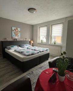 Postel nebo postele na pokoji v ubytování Hotel Gambrinus