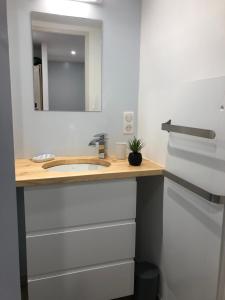 a bathroom with a sink and a mirror at Gite La Barthe Basse in Le Pont-de-Montvert +35 photos