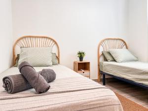 Postel nebo postele na pokoji v ubytování Tarifa Cozy House - Las Cañas I