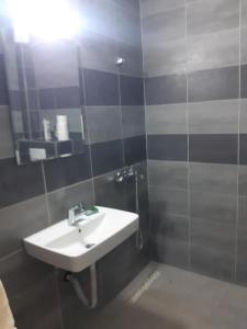 Koupelna v ubytování Dinos Apartments