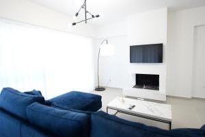 Televisyen dan/atau pusat hiburan di Ennea Suites-Frost suite