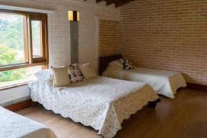 Voodi või voodid majutusasutuse Espectacular Casa Campestre toas