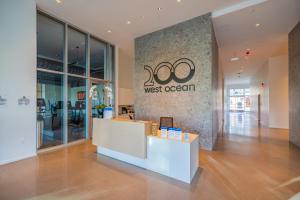 a west ocean store with a sign on the wall at @ Marbella Lane - Penthouse w/ City & Ocean Views in Long Beach +101 photos