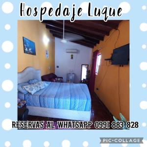 Postel nebo postele na pokoji v ubytování Hospedaje Luque