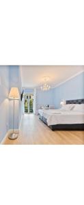 Finest rooms Leonilda客房内的一张或多张床位