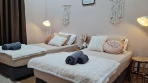 Postel nebo postele na pokoji v ubytování บ้านเซฟโซน + 37 fotografií