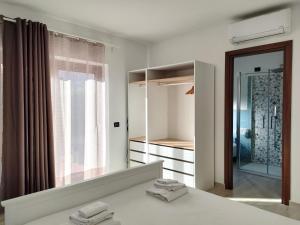 Postel nebo postele na pokoji v ubytování Zenia Rooms