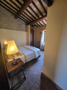 Country House La Collina di Bargiano - Casa Raffaella客房内的一张或多张床位