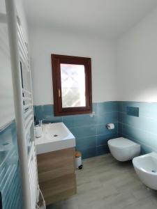 Koupelna v ubytování Zenia Rooms