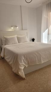 Postel nebo postele na pokoji v ubytování Apartamento Sol y Mar