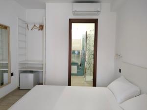 Postel nebo postele na pokoji v ubytování Zenia Rooms