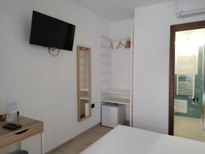 TV a/nebo společenská místnost v ubytování Zenia Rooms