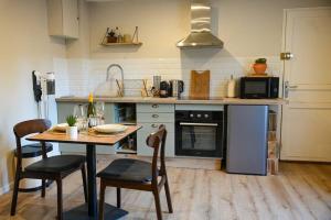 Kuchyň nebo kuchyňský kout v ubytování Appartement Saint-Valery