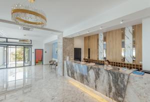 TV a/nebo společenská místnost v ubytování HOTEL TALIA