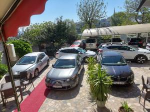 a group of cars parked in a parking lot at Biter Hotel in Istanbul