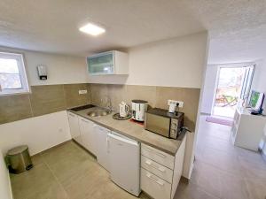 Küche/Küchenzeile in der Unterkunft Apartments Ivanka