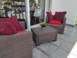 Ein Sitzbereich in der Unterkunft Apartamentos en Leis Muxia