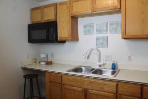 Η κουζίνα ή μικρή κουζίνα στο Discounted Cozy Home with Modern Amenities +5 φωτογραφίες