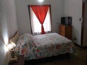 Postel nebo postele na pokoji v ubytování Cabaña hostal Ema