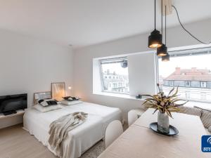 Postel nebo postele na pokoji v ubytování Seaside Comfort in De Haan