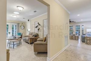 a living room with a couch and a table at 223 Lighthouse Circle home in Fernandina Beach