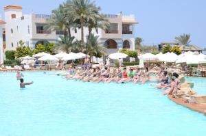 The swimming pool at or close to Rehana Royal Beach Resort - Aquapark & Spa - Family & Couples Only - Premium Ultra All-Inclusive 24H