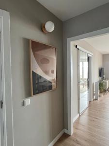 TV a/nebo společenská místnost v ubytování Sanxenxo a un minuto playa vistas y Garage 8pax