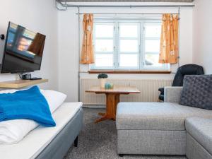 TV a/nebo společenská místnost v ubytování Seaside Retreat in Kegnaes - By Traum Ferienwohnungen