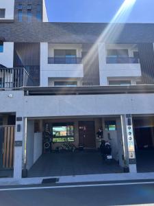a building with bikes parked in front of it at T-HOUSE in Taitung City