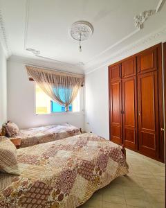 Letto o letti in una camera di Visit Tanger - Sol y Mar