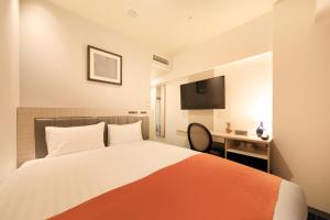 Katil atau katil-katil dalam bilik di QuintessaHotel KagoshimaTenmonkan Relax&Sleep