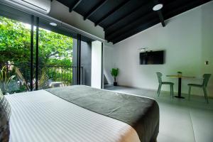 TV a/nebo společenská místnost v ubytování Barcelo Coliving