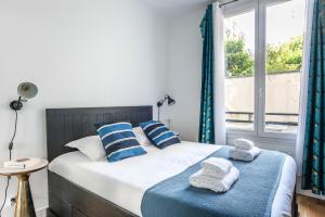 Postel nebo postele na pokoji v ubytování Modern & Cosy flat - 4 guests - Eiffel Tower