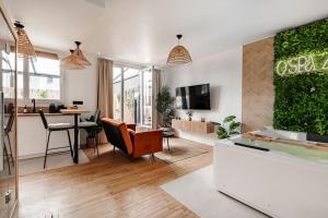 Кът за сядане в Appartement spa : O'Spa Zen Jacuzzi-Sauna-Terrasse