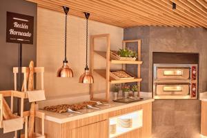 Kuchyň nebo kuchyňský kout v ubytování Universal Hotel Lido Park & Spa