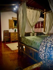 Un pat sau paturi într-o cameră la Villa sarda